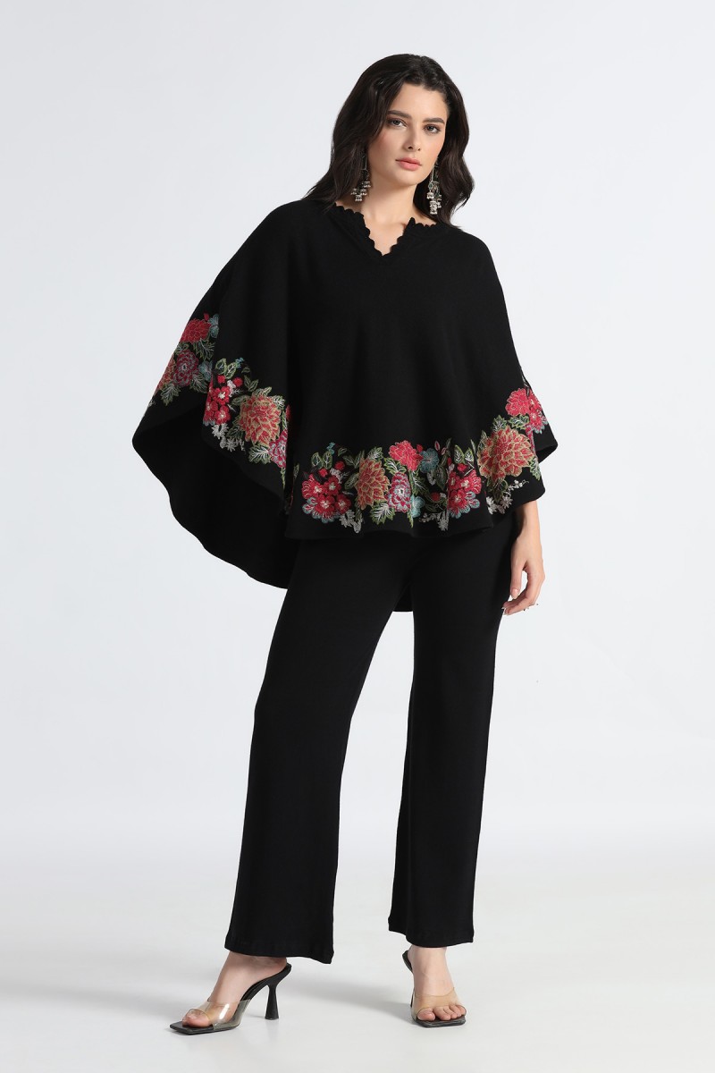 KNITED PONCHO WITH FLORAL EMBROIDERED BORDER
