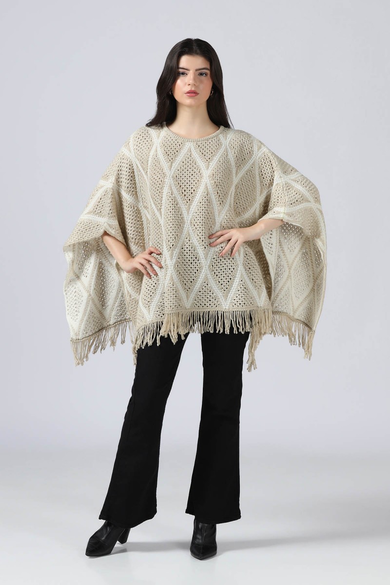 POINTELLE KNIT METALLIC PONCHO WITH FRINGS